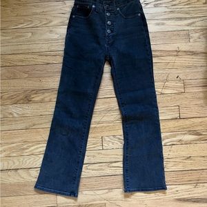 Button up, stretchy, slightly flared (washed) black Madewell Jeans.